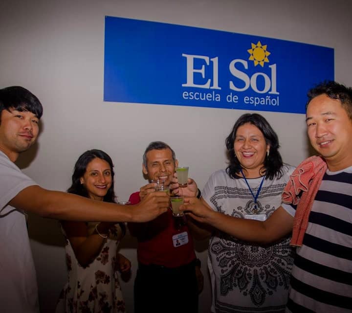 Immersion Spanish Students cheering drinks at EL SOL school