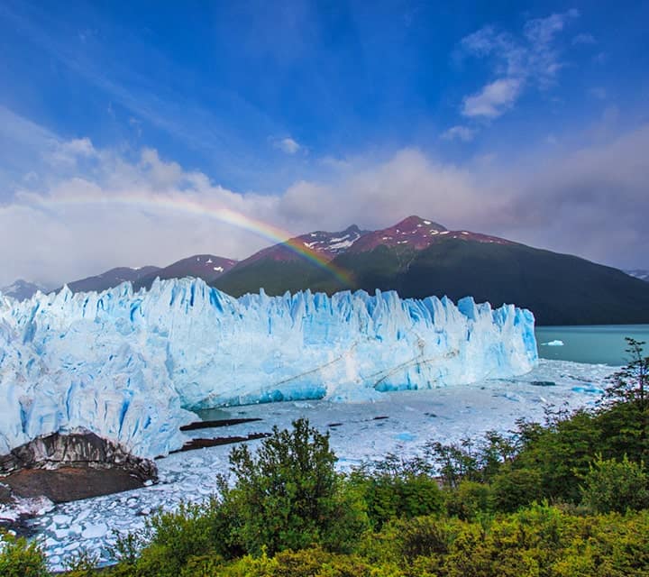 Rainbow over Perito Moreno Glacier in Los Glaciares National Park