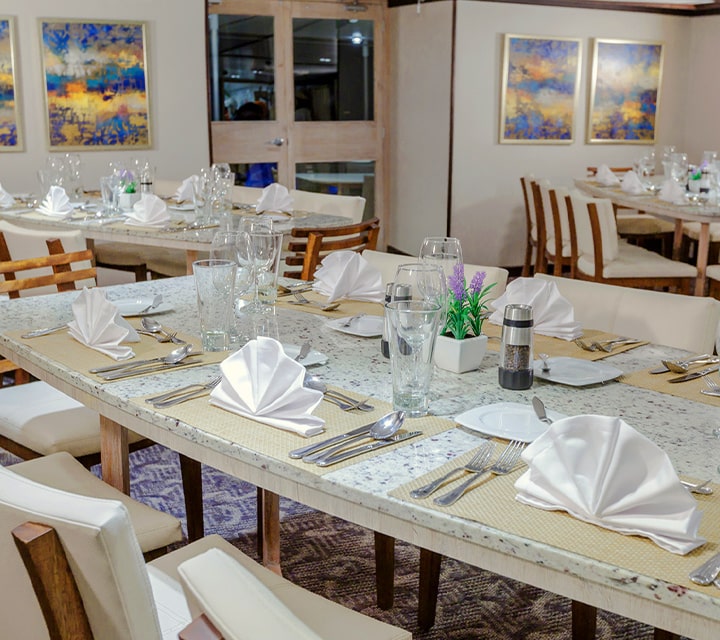 Luxury yacht table setting aboard Evolution Yacht in the Galapagos Islands
