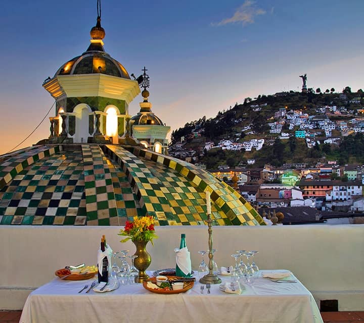 Newlywed rooftop dinner in Ecuador