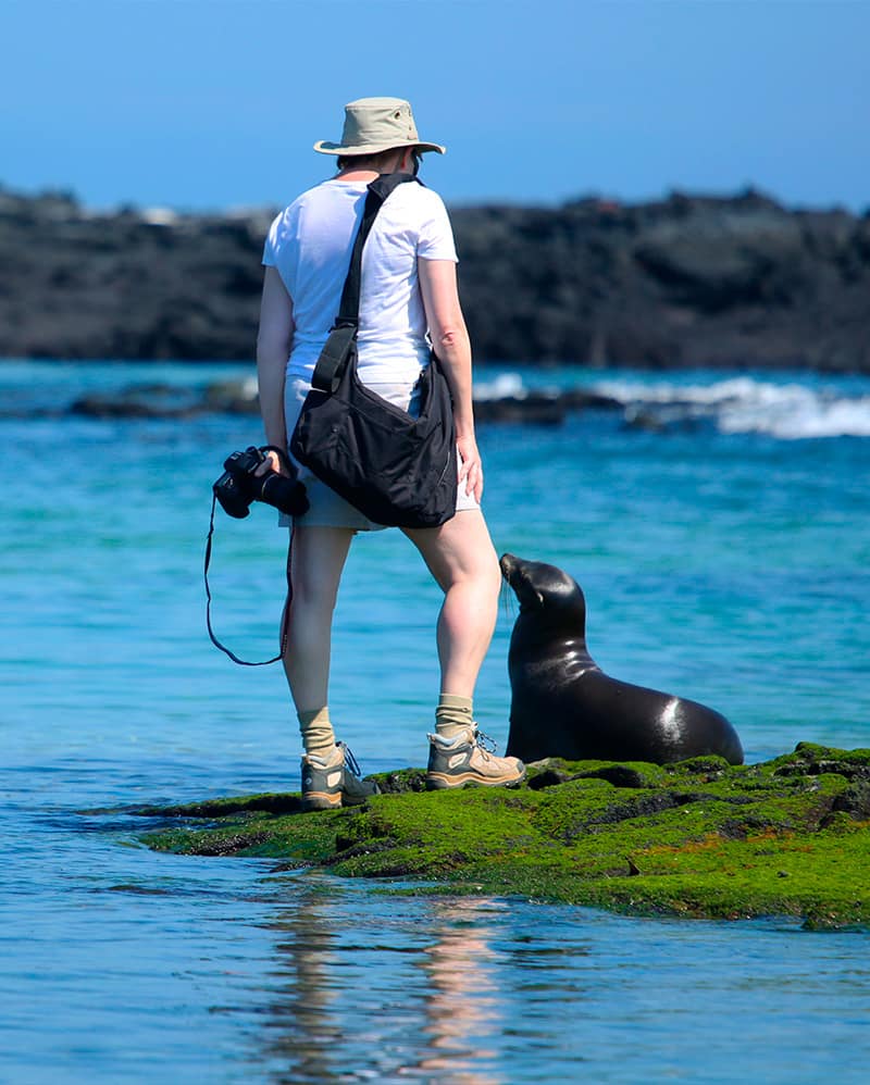 Guest up-close with a Galapagos sea lion