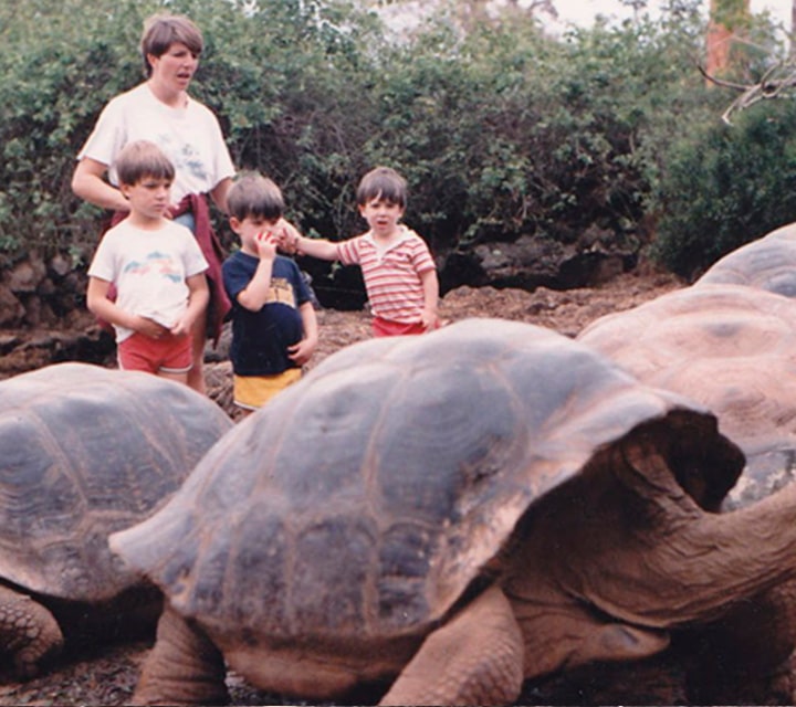 Diez family in Galapagos with Giant tortoises